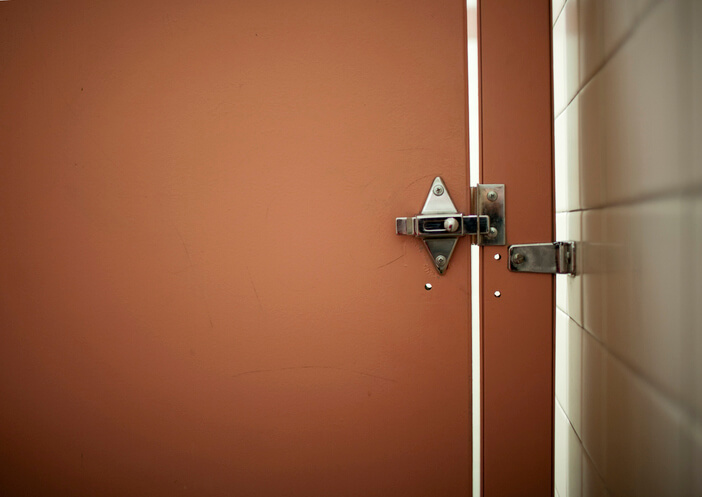 bathroom stall door and lock